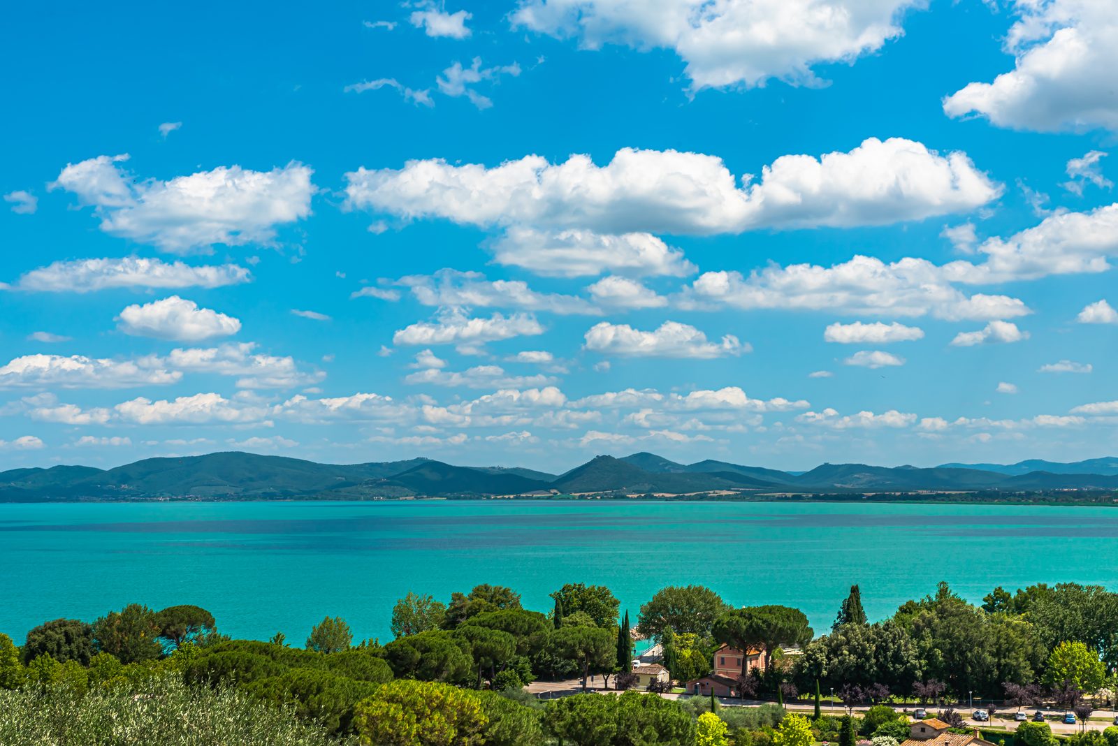 Turquoise water of Lake Trasimeno seen from Castiglione del Lago